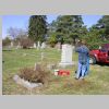 Wamboldt-Cem-009_Linda-Hoyt-picking-up-rose-bush-prunings+03-29-07.jpg